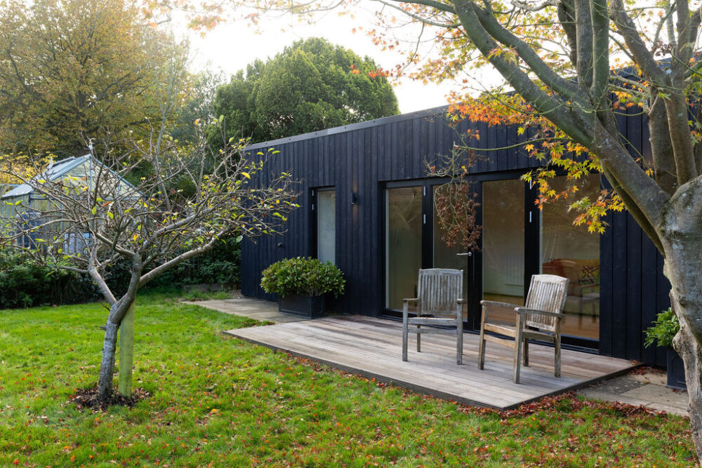 Garden room cranleigh external with chairs